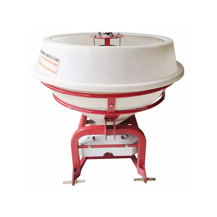 De toepassing van kunstmeststrooiers op het veld