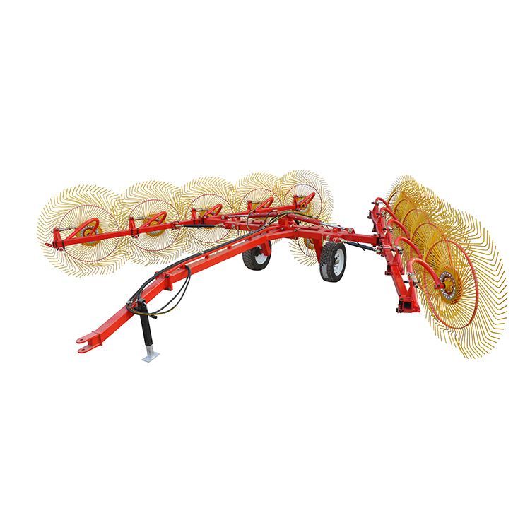 Roterende tractor hark